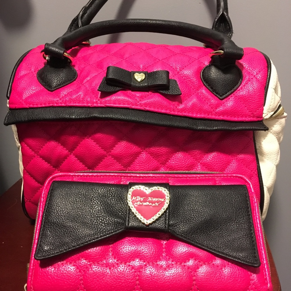 Betsy Johnson handbag with matching wallet.